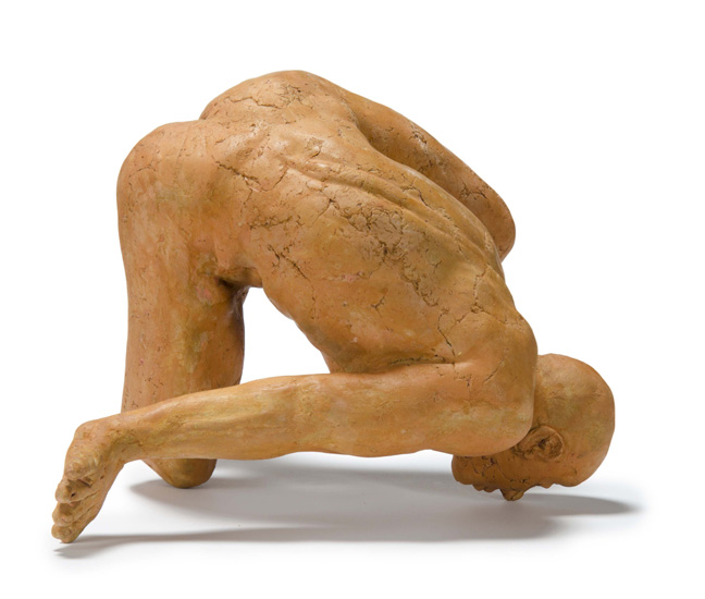 TUMBLER was developed from a crouching nude male model with one arm extended which allowed for the figure, when finished, to be flipped upside down and sideways so as to suggest an acrobat. 