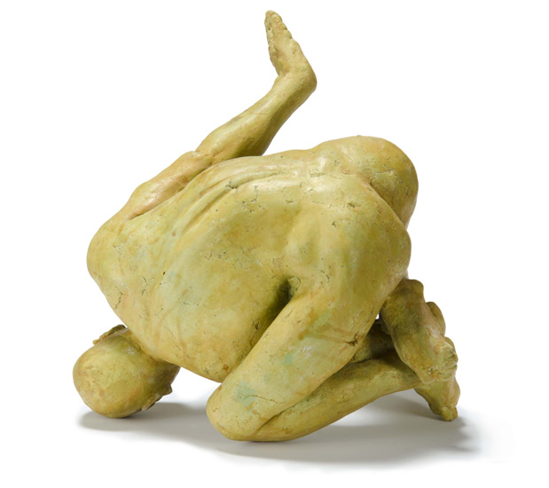TUMBLER was developed from a crouching nude male model with one arm extended which allowed for the figure, when finished, to be flipped upside down and sideways so as to suggest an acrobat. 