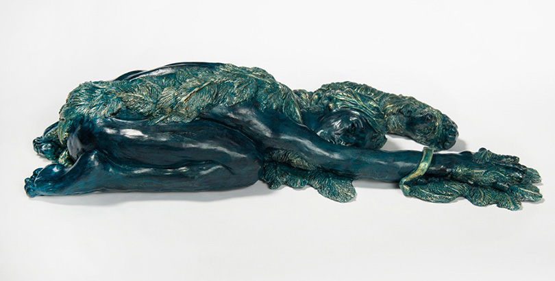 ICARUS by Janet Hunter in Greek myth made wings of wax in order to fly but flew too close to the sun melting the wax; a crouching winged man, arms extended in free fall; an allegory for hubris