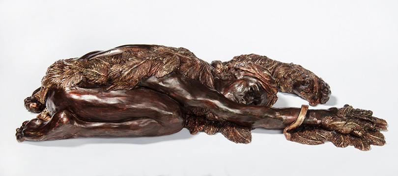 ICARUS by Janet Hunter in Greek myth made wings of wax in order to fly but flew too close to the sun melting the wax; a crouching winged man, arms extended in free fall; an allegory for hubris